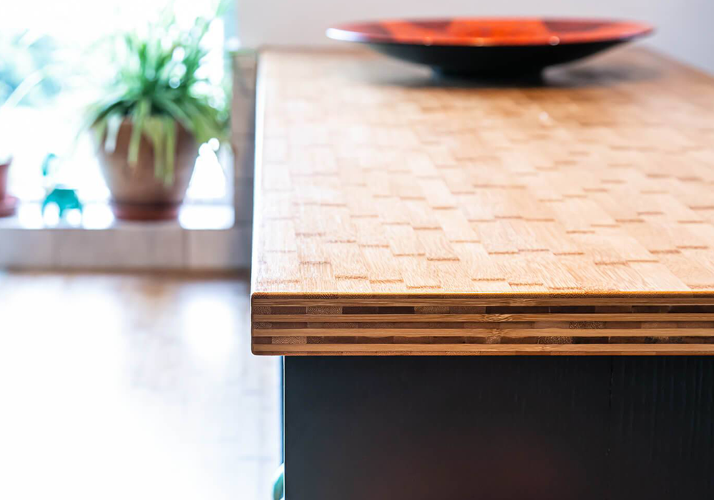 The 40mm nine ply bamboo worktop installed in a kitchen made by a sustainable kitchen design company