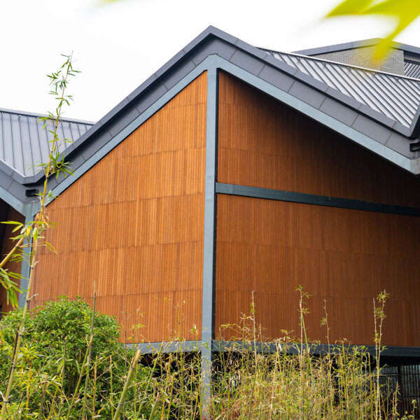 The CTECH bamboo lumber used to clad the exterior of a large building