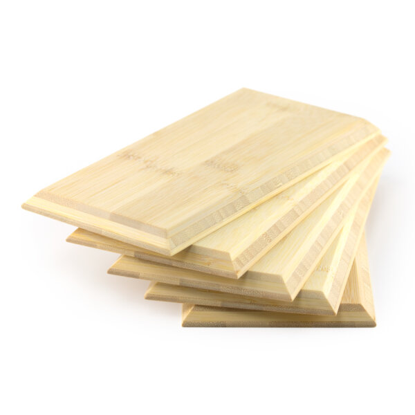 A stack of natural bamboo brick wall tiles for interior design