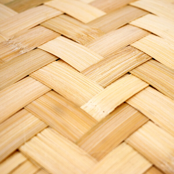 A close-up of the bamboo matting made from weaving strands of bamboo