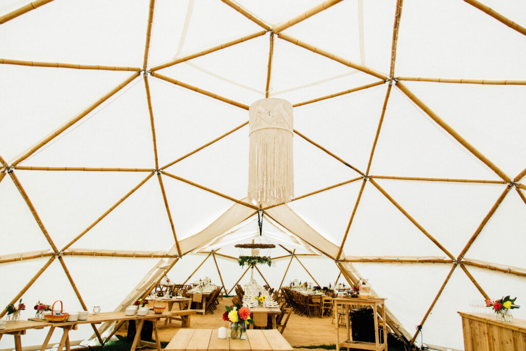 An interior shot of the geodesic dome made by Atlas Domes using strong natural bamboo poles