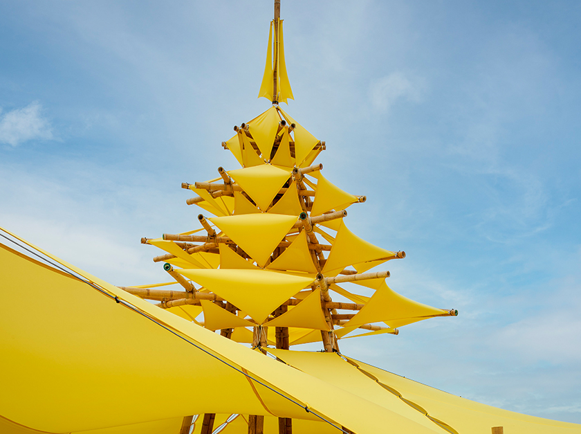 Bamboology 'The Beacon' sculpture in Rye made from Guadua bamboo poles and a yellow stretch tent fabric