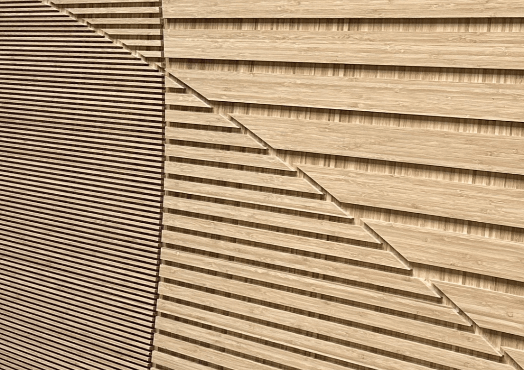 A close-up of fluted bamboo wall panelling, designed by our clients Genesis Surfaces.